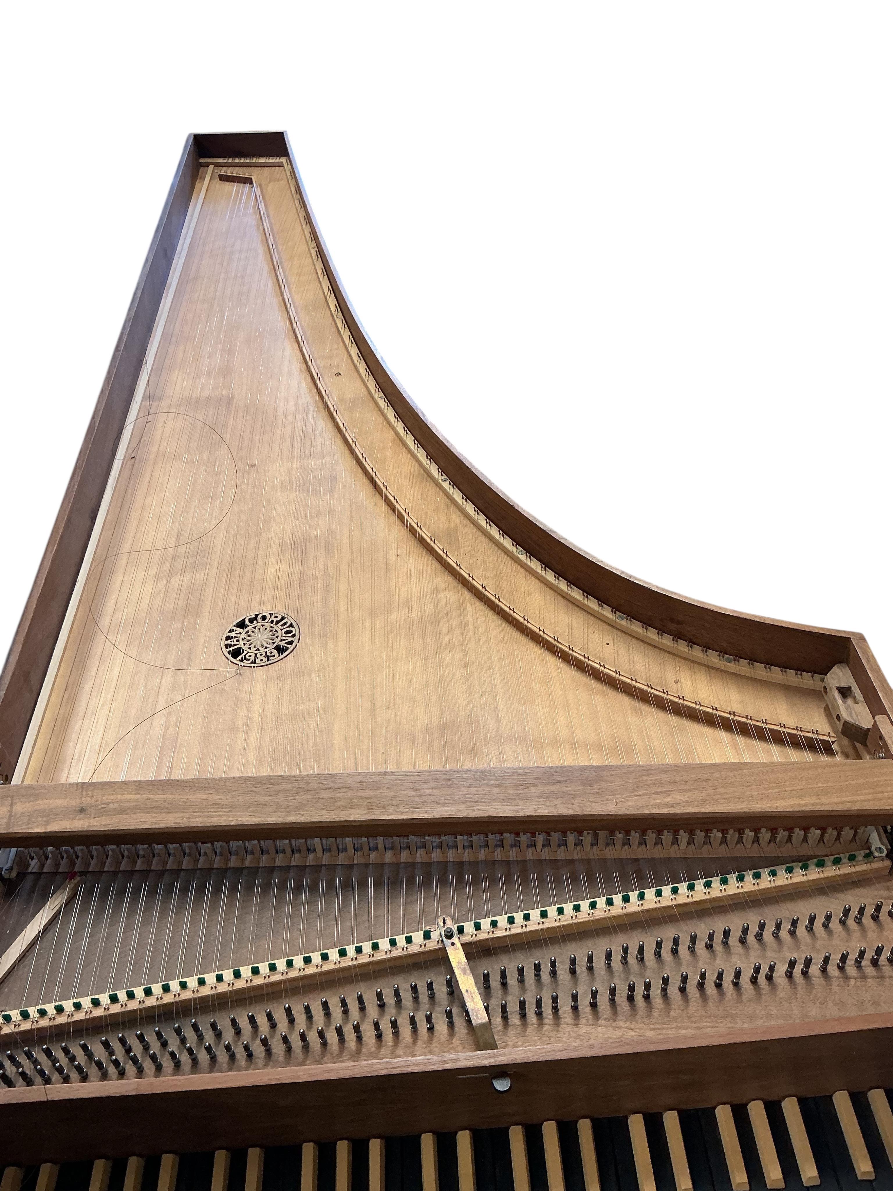 An Italian style single manual harpsichord built by Ian Gordon in 1989, in a walnut veneer case, Gordon is better known for his lutes, 54 note compass on small scale keys, and two stops, length 202cm